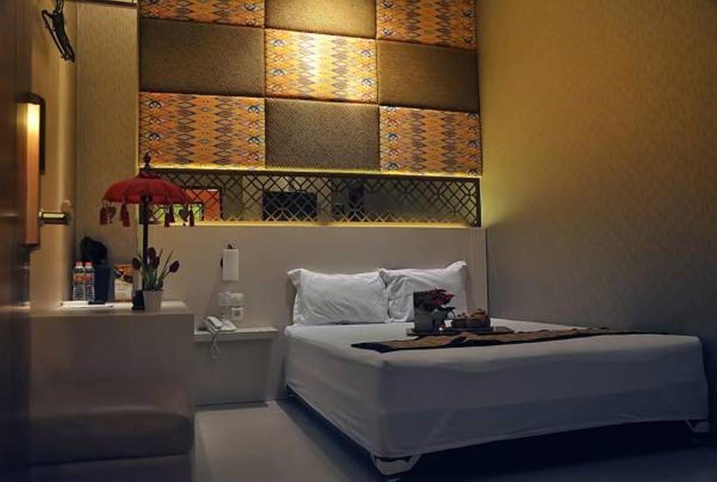 Metro House Hotel Surabaya Habitación foto